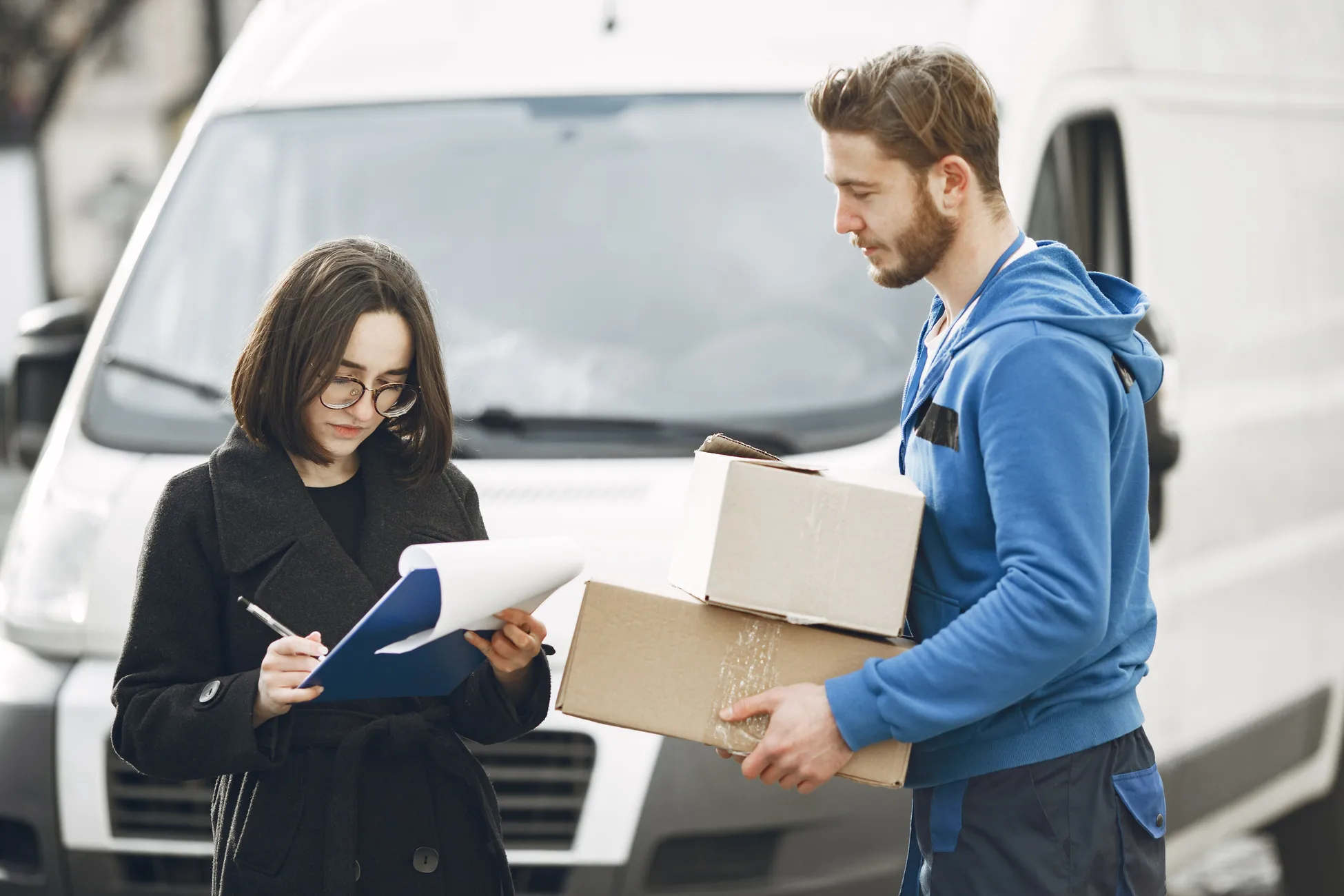 Logistics professional managing package delivery and shipping operations.