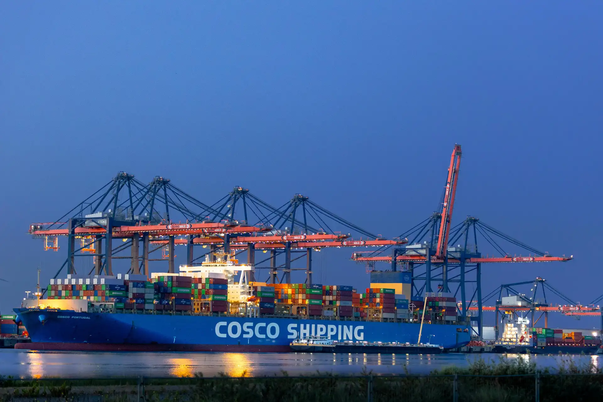 Cargo vessel at a modern shipping port