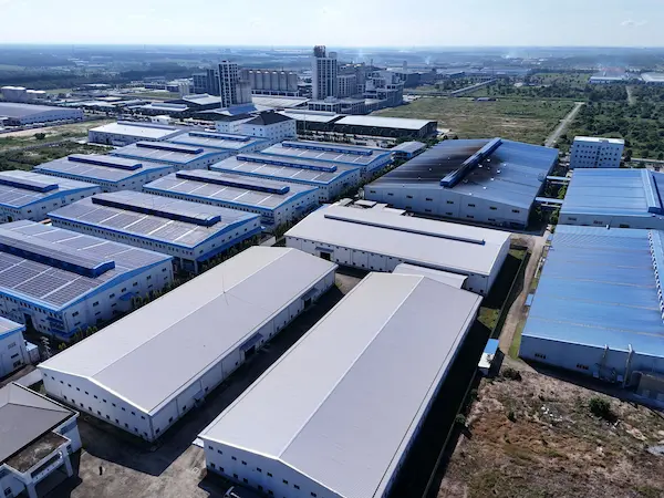 Aerial view of a modern industrial warehouse and manufacturing facility complex